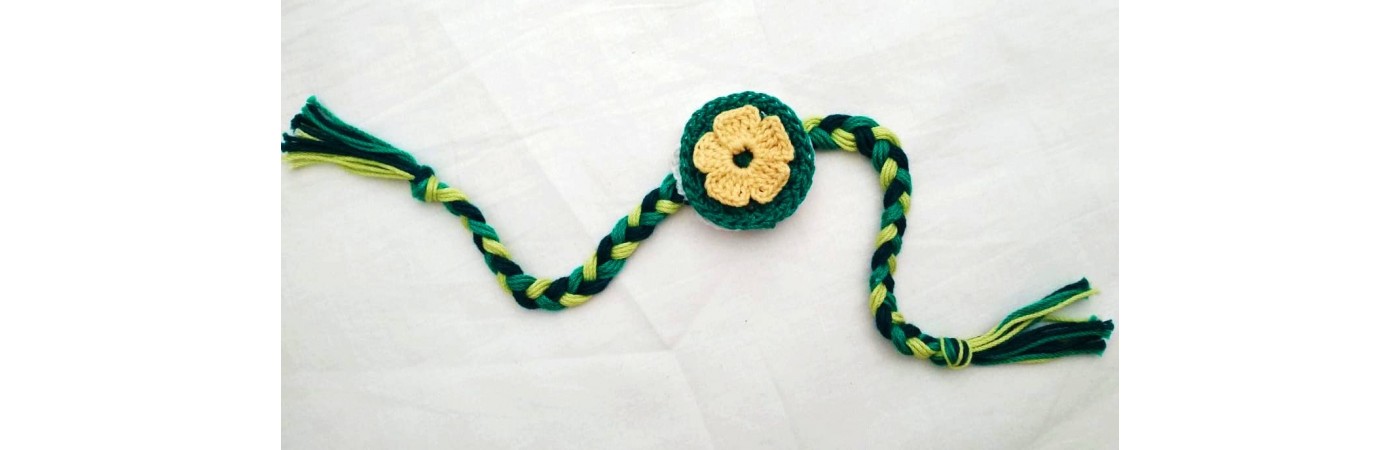 Happy Threads Handcrafted Crochet Raakhi (Green & Black)